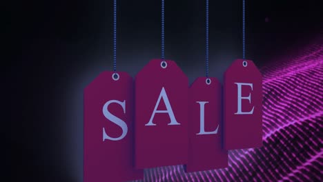 animation of sale on tags over glitter on black background