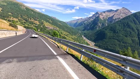 car driving through scenic mountain road