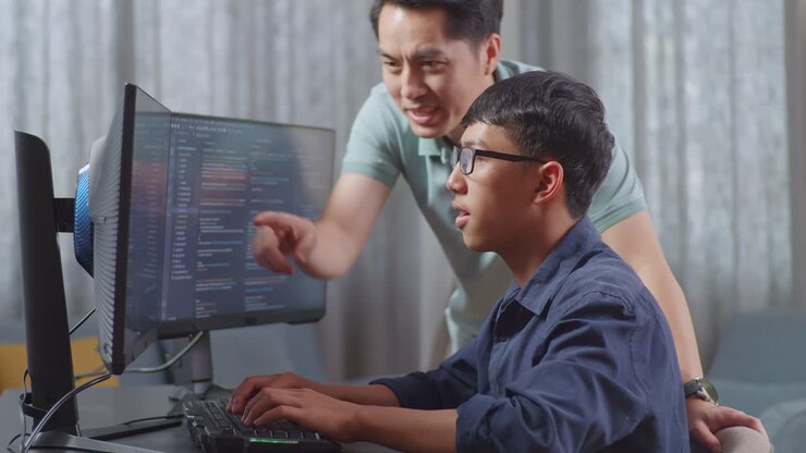 Mentor Guiding Student in Programming