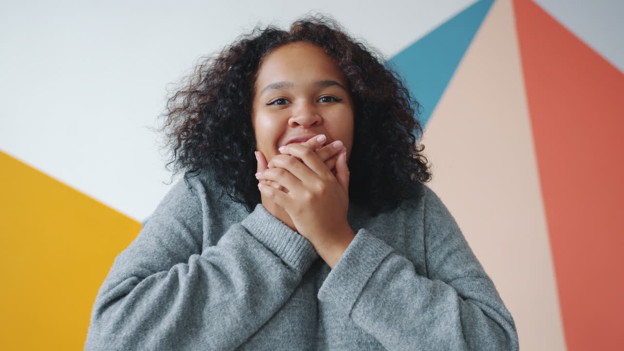 Woman expressing surprise and happiness