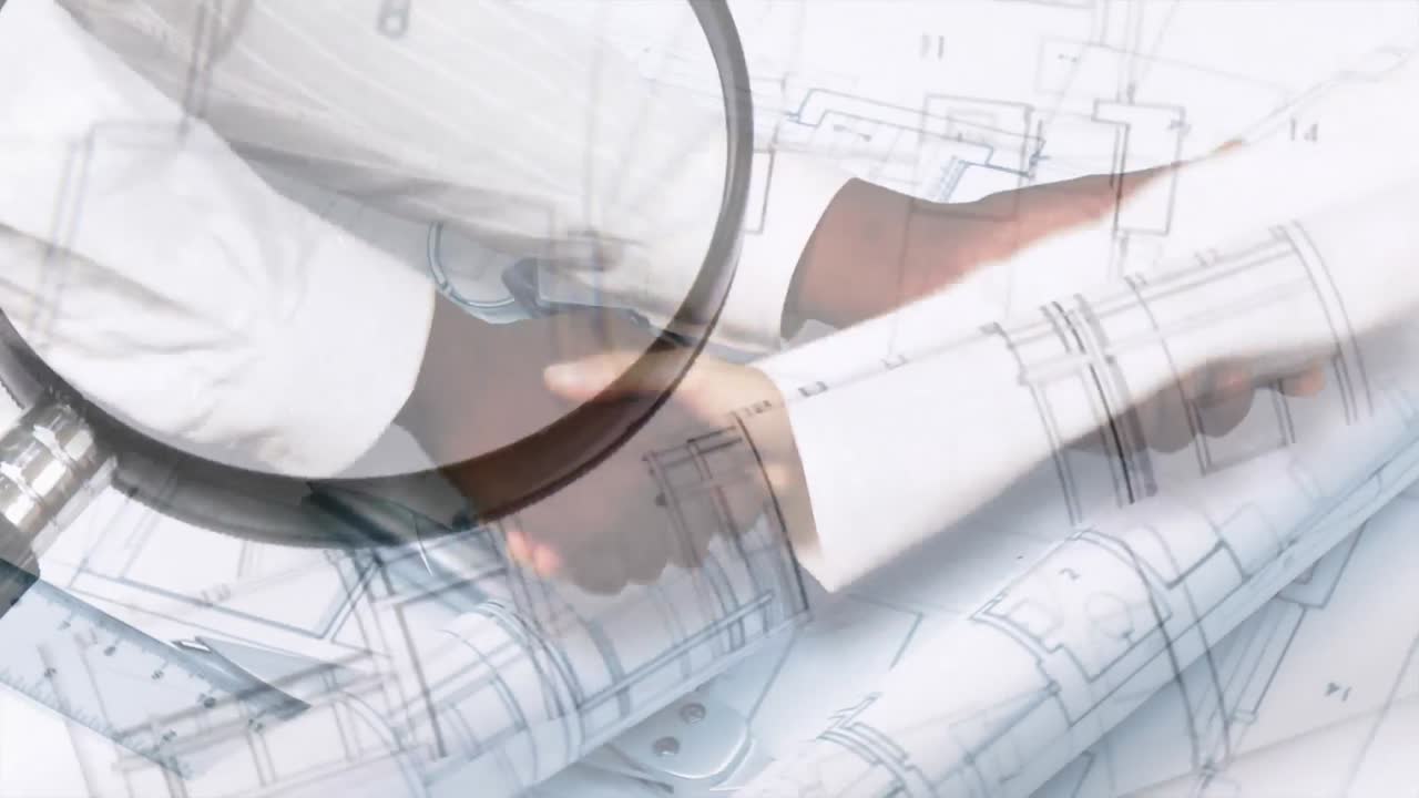 los arquitectos se dan la mano.