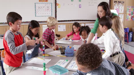 Teacher-and-young-kids-use-blocks-in-class,-shot-on-R3D