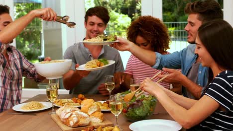 happy friends eating salad