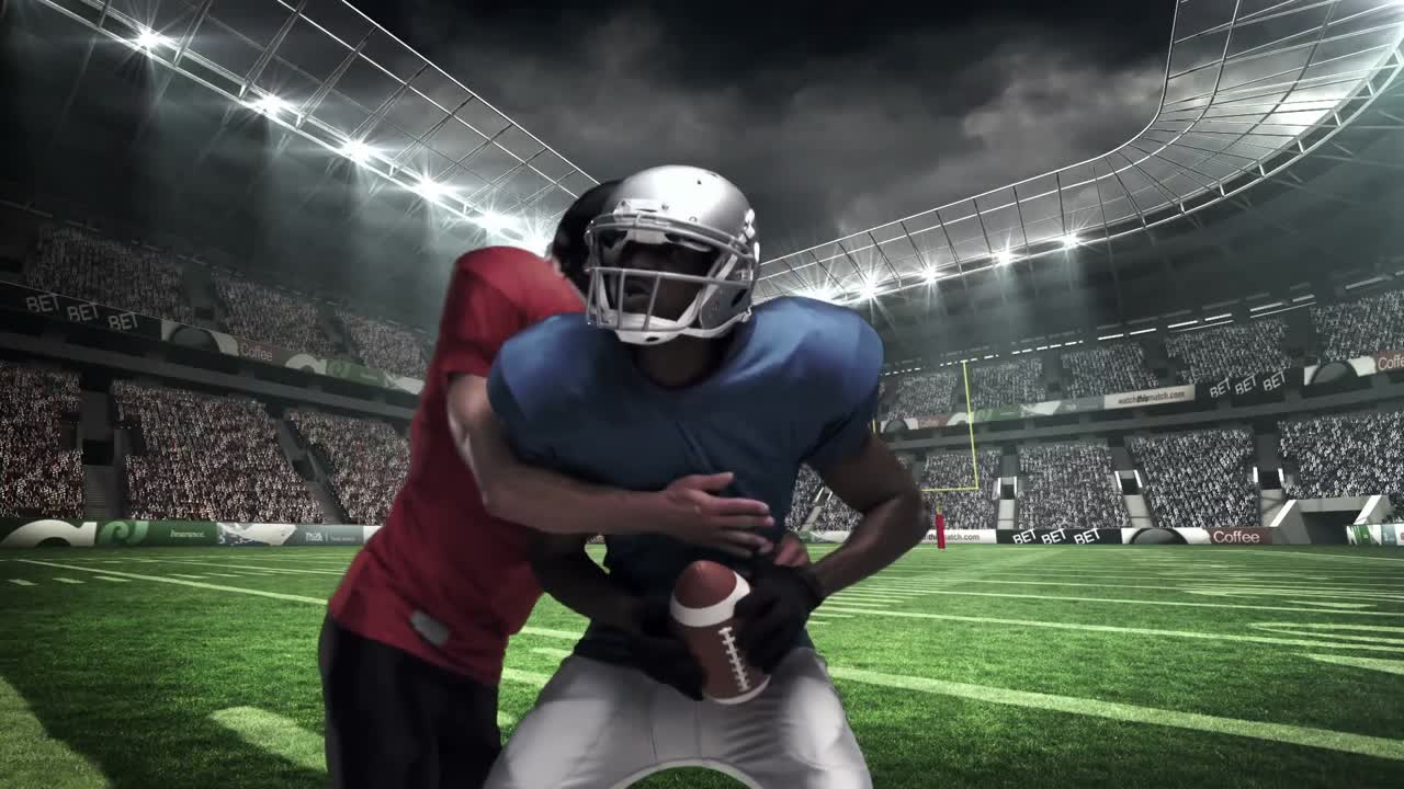 Giocatore di football americano che placcato per il pallone
