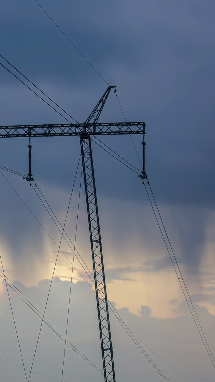 Vertical View Of A High-Voltage Power Line Of An Electrical Transmission System. Timelapse