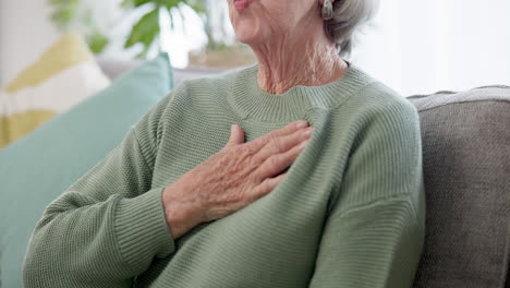 Hand,-chest-and-a-senior-woman-with-heart-disease