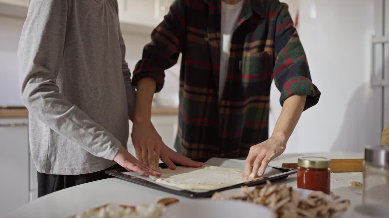 People Making Pizza at Home