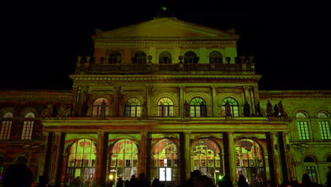 stunning light projection on historical building at night