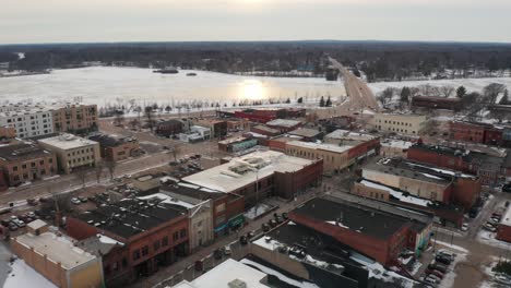 aerial, empty downtown stevens point during winter season