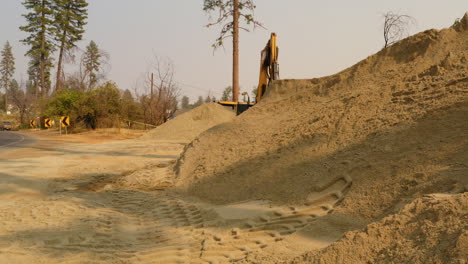 Reveal-shot-of-an-excavator-construction-equipment-machinery