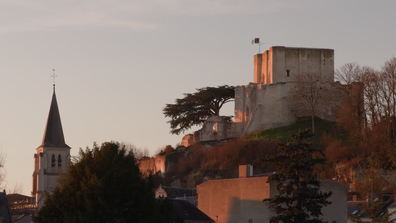 Castle and church at golden hour, Montrichard Val de Cher, France, serene sunset view