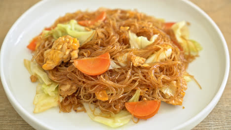 stir fried vermicelli with cabbage, carrot and egg - vegan food style