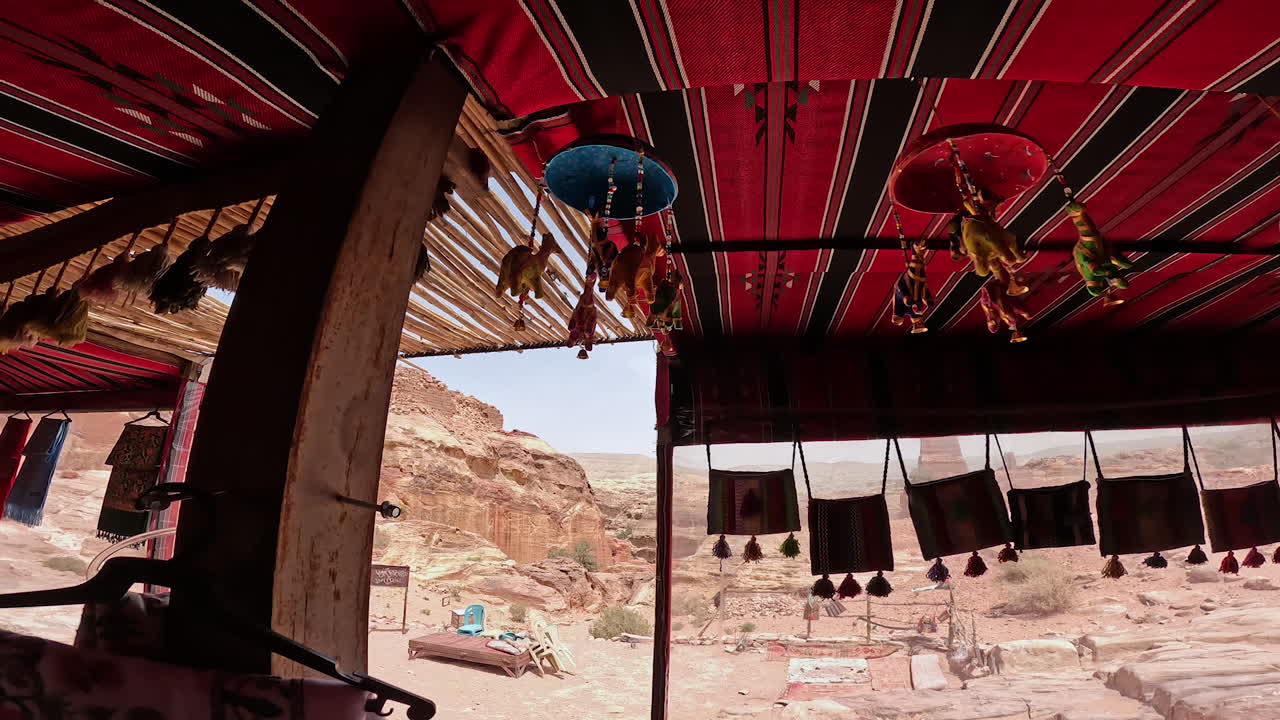 Authentic traditional stuff in the little shop of Bedouins. Souvenir store surrounded by the sandstone rocks of Petra, Jordan, West Asia.