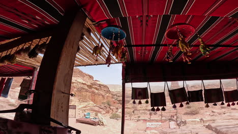 authentic traditional stuff in the little shop of bedouins. souvenir store surrounded by the sandstone rocks of petra, jordan, west asia.