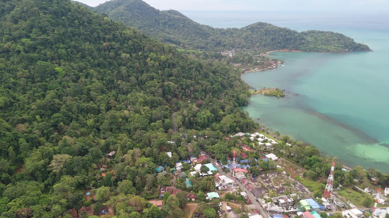 Drone view of Lonely Beach village and tropical sea at Koh Chang the coastline, mountains and jungle