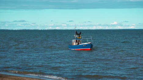 fishing boat on the sea, ocean at the sunset