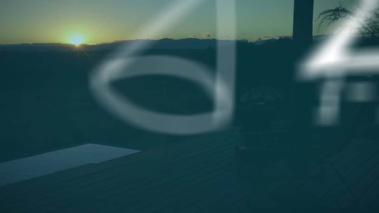 Mathematical symbols and equations animation over sunset landscape