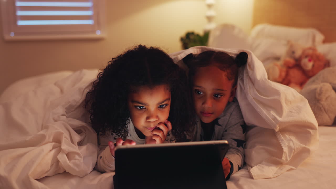 Girls, tablet and kids in bedroom at night