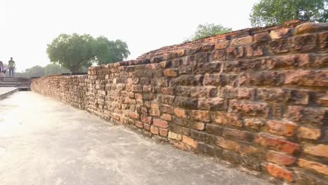The-Ancient-Ruins-of-the-Archaeological-Site-in-Sanarth,-Varanasi,-India-with-Close-Up-of-Brick-Walls