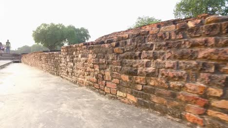 the ancient ruins of the archaeological site in sanarth, varanasi, india with close up of brick walls