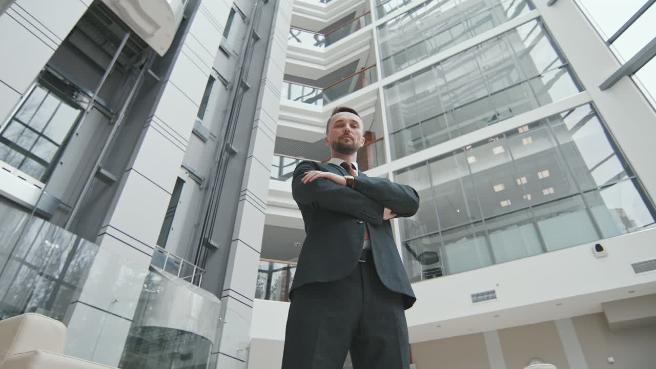 Low-Angle of Male Lawyer in Big Office