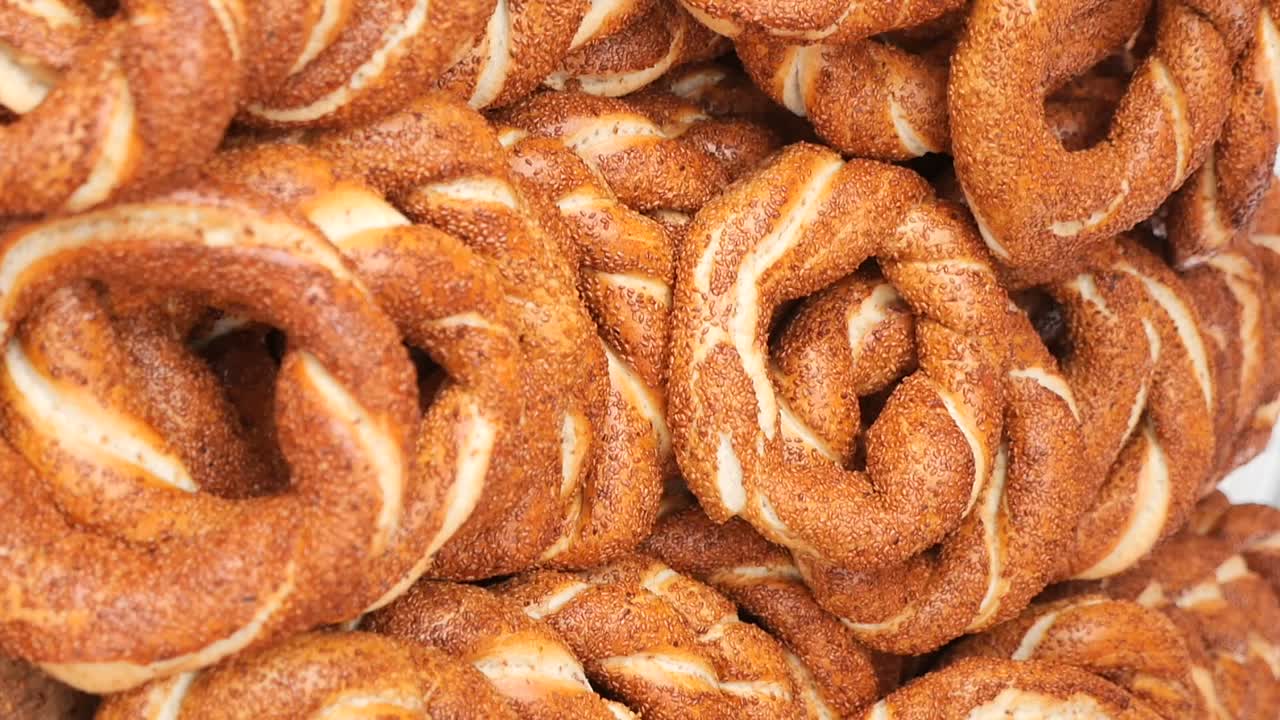 Pile of Freshly Baked Turkish Simit with Sesame Seeds