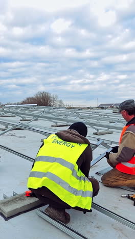 working on installation solar panel. electrician working on installation solar panel at solar power plant