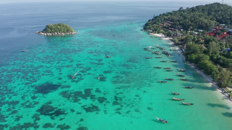 aerial of longtail boats in koh lipe, thailand