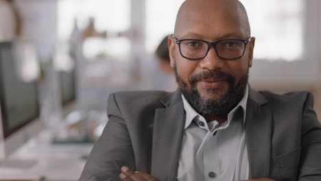 portrait-confident-businessman-smiling-happy-with-arms-crossed-proud-entrepreneur-enjoying-successful-startup-company-in-office-workspace