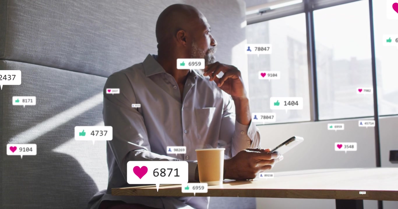 Animation of social media data processing over african american businessman using smartphone