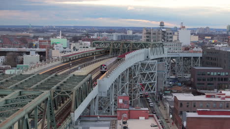 aerial view of the subway on an elevated railway track in brooklyn. shot on an overcast day in gowanus.