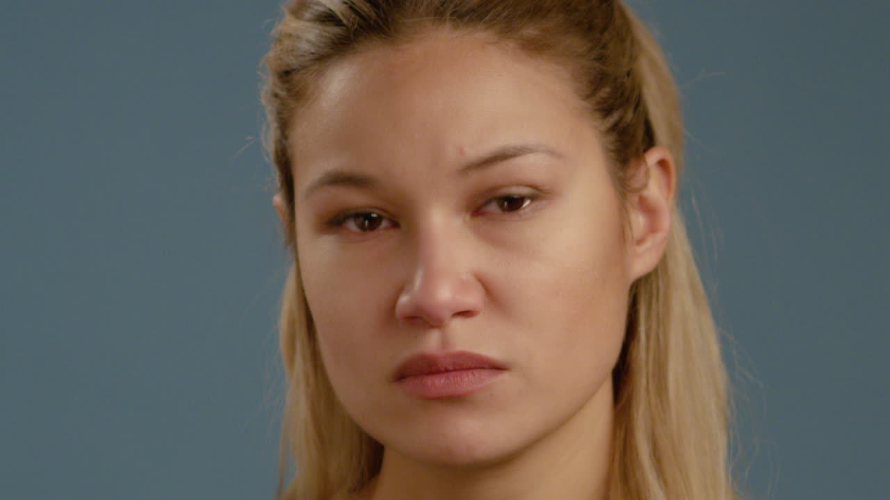 CU Upset Woman with Tears in Eyes