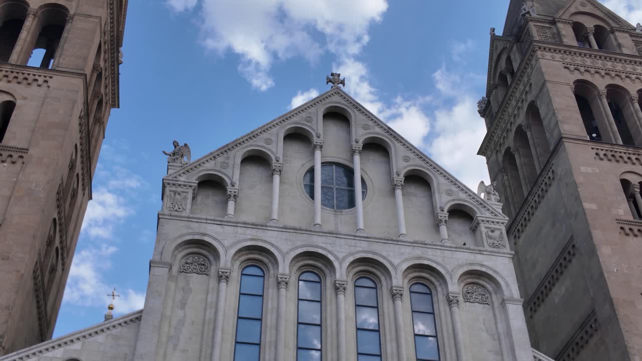 Tilt-up of Pécs Cathedral, highlighting its ornate facade and grand architectural details