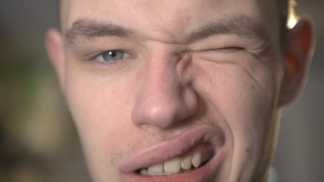 Closeup Face Of Attractive Young Man - Closeup Shot