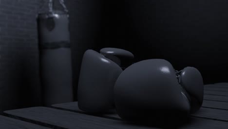 close up of boxing gloves on wooden bench with punching bag in the background