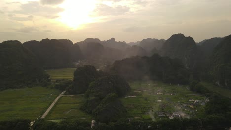 Scenic nature landscape Vietnam sunset aerial drone Ninh Binh limestone mountain cliff