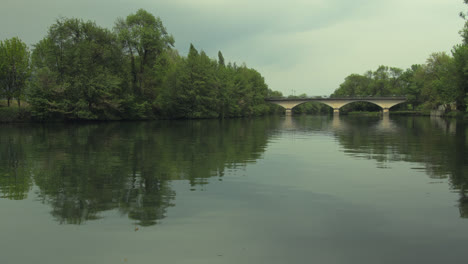 a slight overcast hangs over a calm river in cognac, france