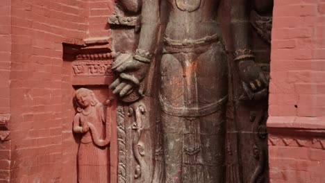 hindu statue detail in kathmnadu in nepal at pashupatinath temple, close up of a religious statue at a hindu religious site
