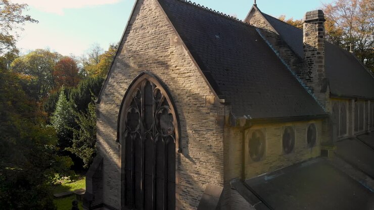 Old British Church in The Light of the Summer Sun at Golden Hour Cinematic Footage with DJI Drone