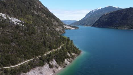 mountain trail next to the lake achen