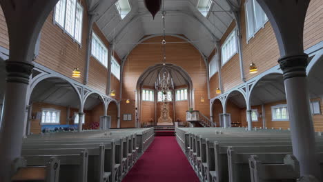 Touring-the-interior-of-Buksnes-church,-Norway