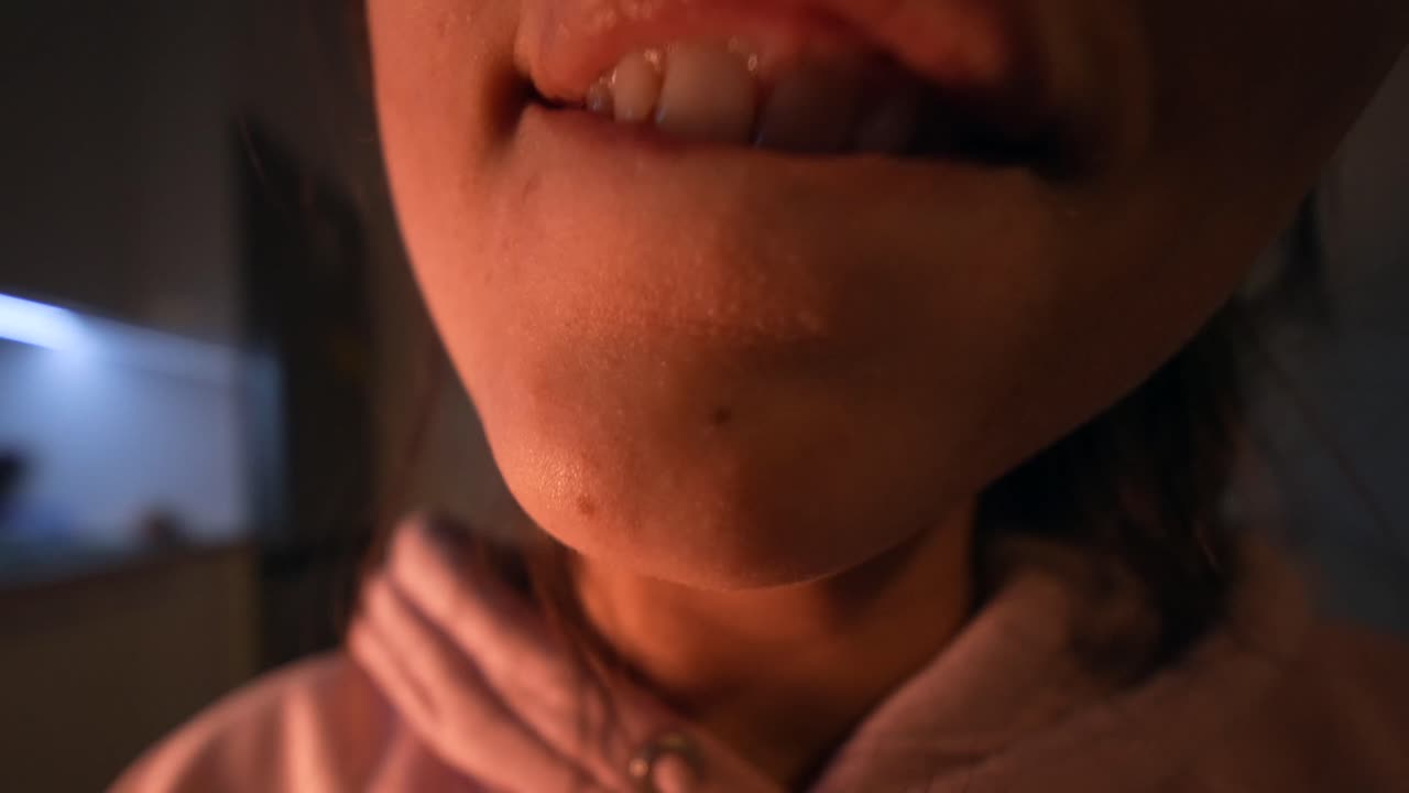 Close-up of a Person's Mouth and Tongue