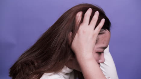 Woman-portrait-with-problem-of-depression-emotion-sad-alone-on-purple-background-7