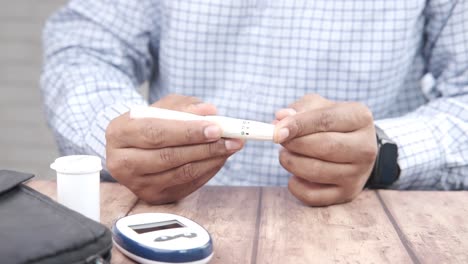 person checking blood sugar