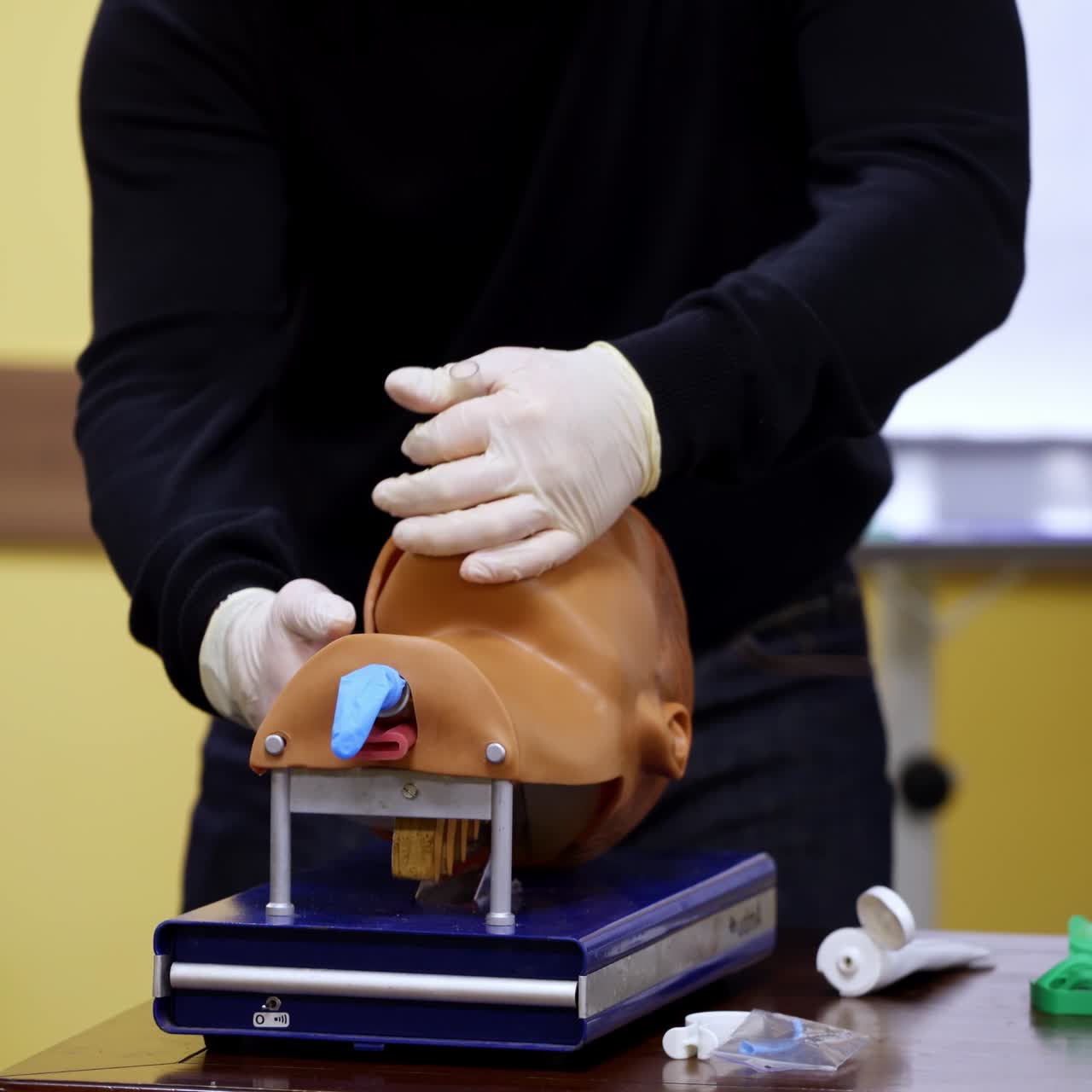 Closeup detail of a medical simulation mannequin head used for practicing anesthetic techniques. Healthcare and education