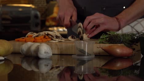 culinary artistry: chef's skillful mushroom slicing on vegetable-filled board