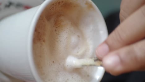 cappuccino being stirred