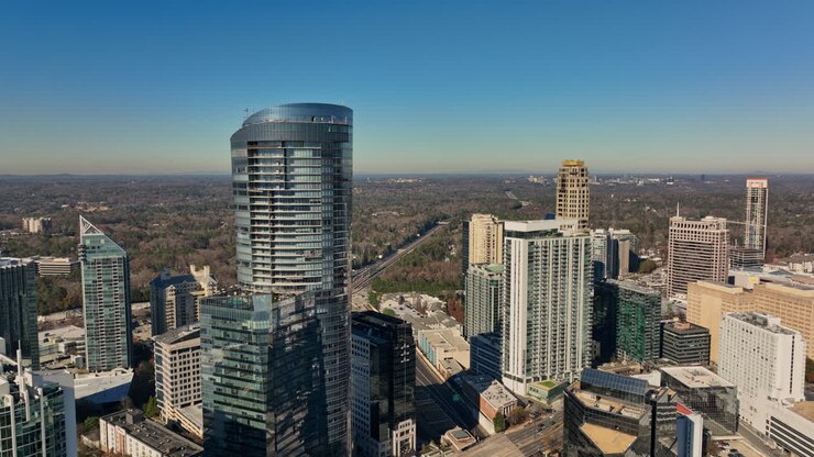 Atlanta Aerial v773 cinematic pull out shot capturing upscale neighborhood of buckhead district, reveals beautiful blue sky background and endless horizon - Shot with Mavic 3 Cine - December 2021