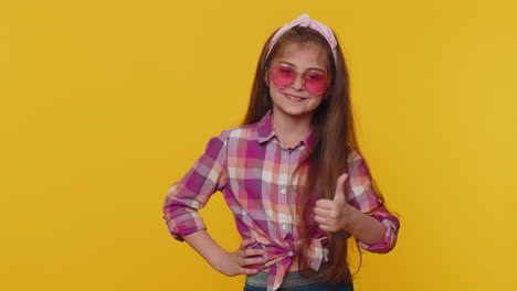 Child-girl-kid-wearing-pink-sunglasses,-charming-smile,-showing-thumbs-up-like,-positive-feedback