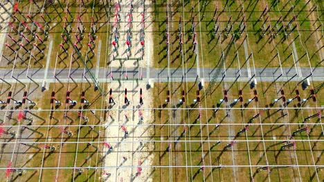 Top-Down-View-Of-High-Voltage-Electrical-Power-Electricity-Substation---drone-shot